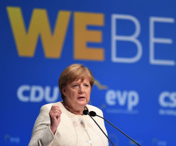 Merkel Gets Reprieve as Unsteady Coalition Postpones Showdown