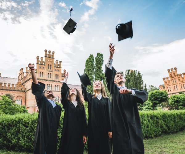 college graduates celebrate