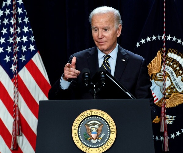 joe biden gestures while speaking