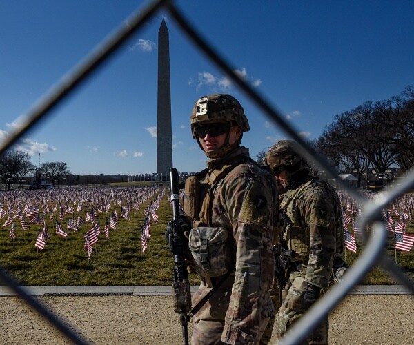 national guard members patrol national mall
