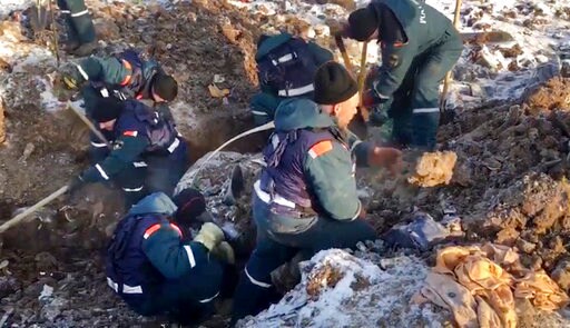 Russian Investigators Study Crashed Plane's Flight Recorders