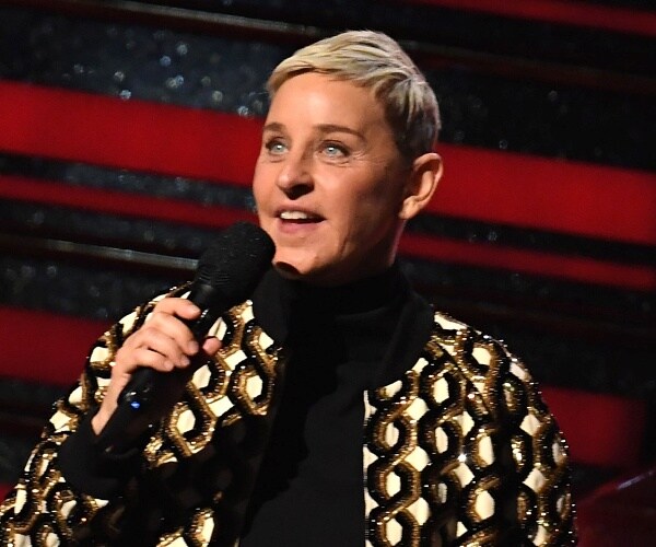 ellen degeneres stands onstage 