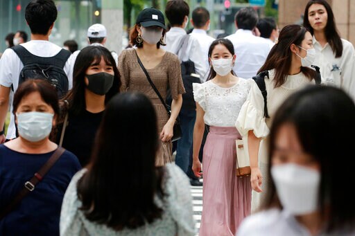 Japan to Further Expand Virus Emergency Areas as Cases Surge