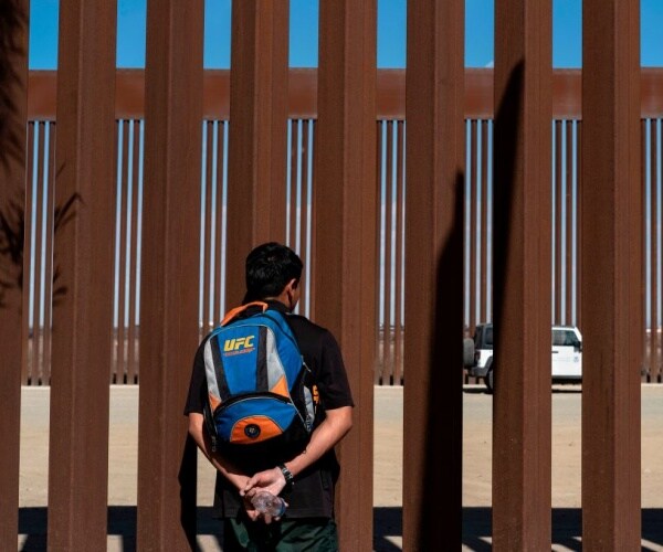 Border Patrol Agent Rescues Mexican Migrant Caught in Border Fence