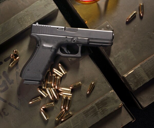 glock pistol and cartridges are shown
