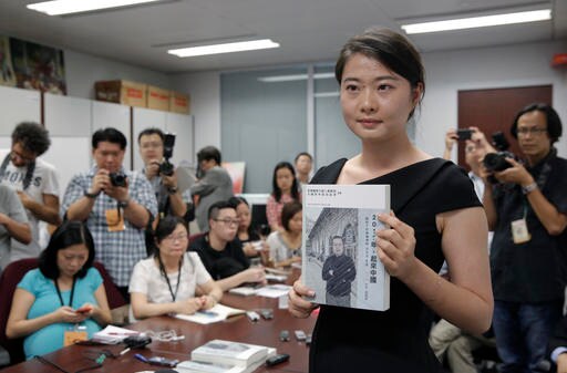 AP Interview: Chinese Lawyer Not Giving up Despite Torture