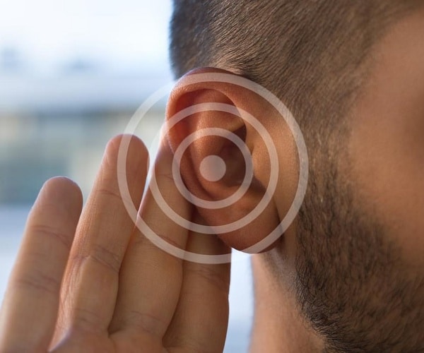 close-up of person's ear, hearing