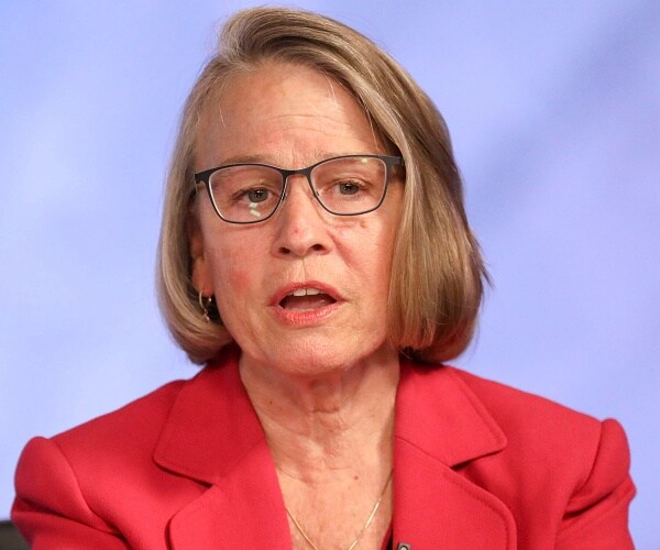 mariannette miller meeks sits in chair