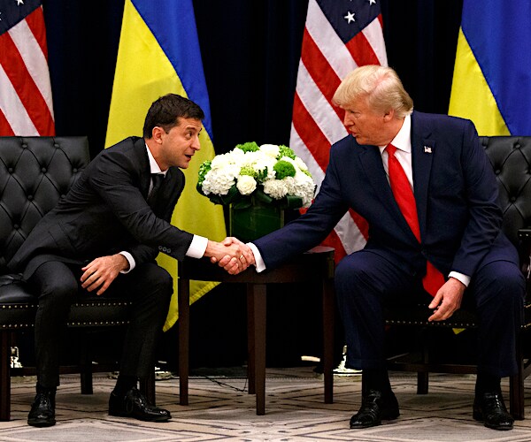 Ukraine President Volodymyr Zelenskiy shakes the hand of President Donald Trump
