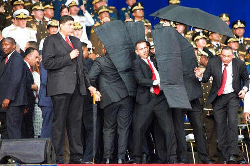 The Latest: Witnesses Saw Venezuela Drones, Blasts