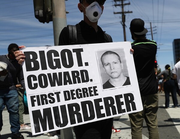 March 8 Trial Date for Four Minneapolis Police Officers Charged in Floyd's Death