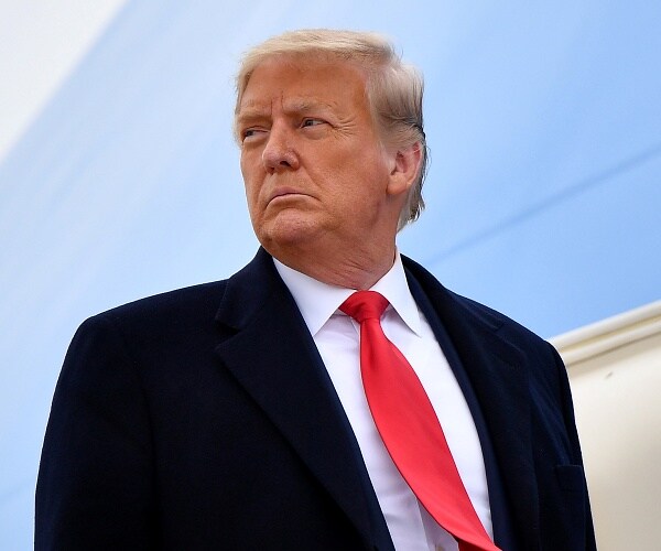 donald trump boards air force one