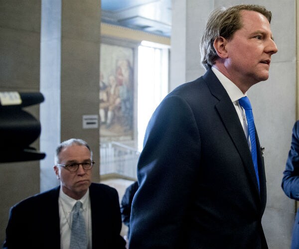 former white house counsel don mcgahn arrives for a farewell ceremony at the doj in washington