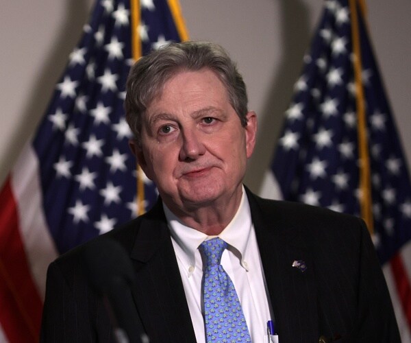 john kennedy speaks to press