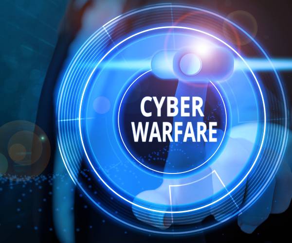 cyber warfare written on a computer button