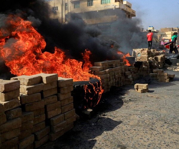 fire in the streets of sudan