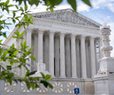 Justices to Hear WH Bid to End Protection for Haitian, Syrian Migrants