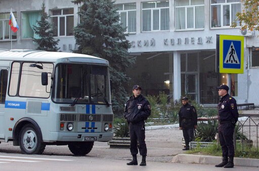 The Latest: Crimea Hunts Possible School Attack Accomplice