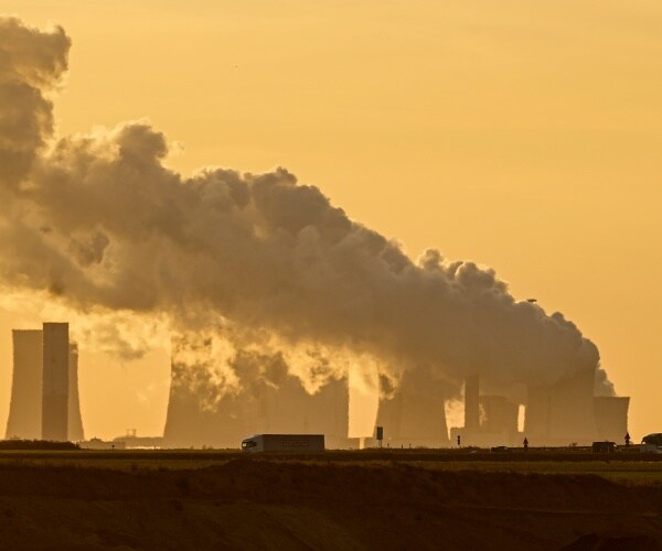 A power plant fires coal from the nearby Garzweiler open-cast mine.