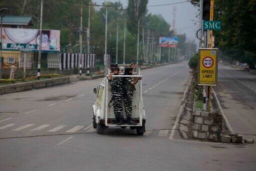 The Latest: Family Says Kashmir Journalist Detained by India