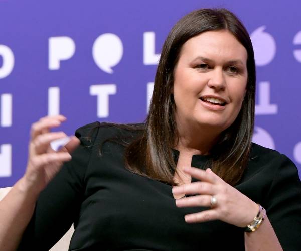 sanders speaking at a conference