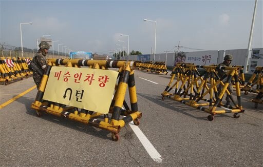 Rival Koreas Hold High-level Talks to Defuse war Fears