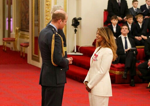 Prince William Honors Singer M.I.A. at Buckingham Palace
