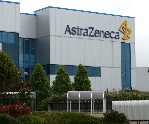 a building has the name and logo of astraZeneca on its side.