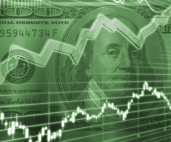 stock market graph over an american one hundred dollar bill. 