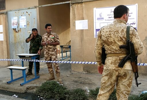 The Latest: Turkey May Close Airspace, Border to Iraqi Kurds