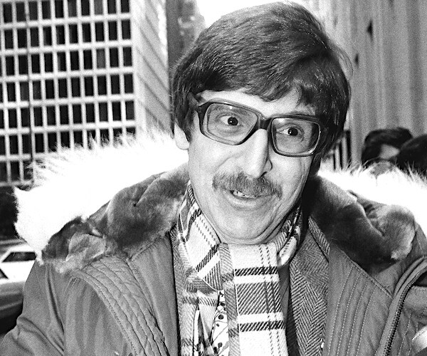 John Limbert talks to reporters outside the Waldorf Astoria Hotel in New York on Saturday, Jan. 31, 1981