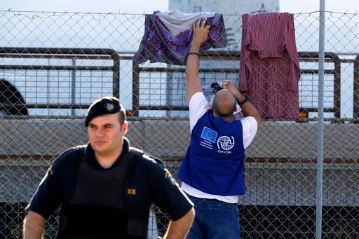 The Latest: Germany Approves Tougher Migrant Measures