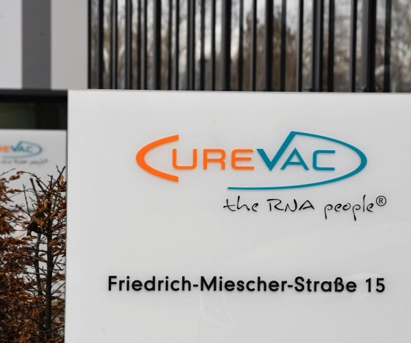 curevac logo is shown in front of company's hq building in tuebingen