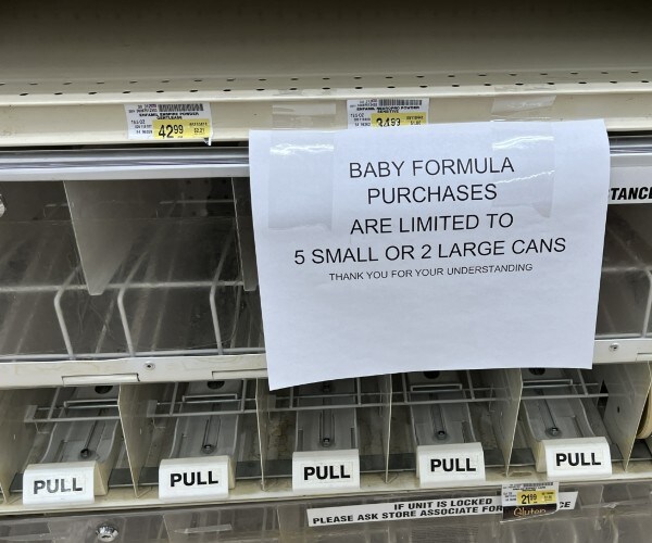 empty grocery shelves for baby formula  