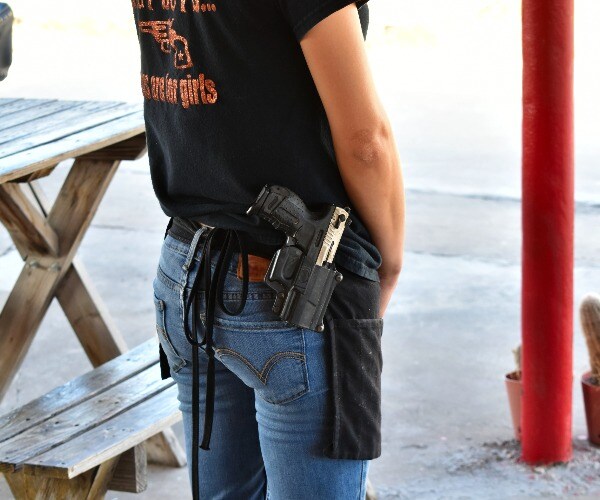 Judge Hears Challenge to Mich. Election Day Ban on Displaying Guns