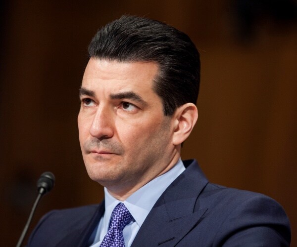 scott gottlieb sits at table