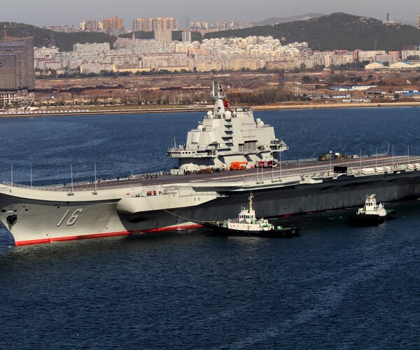 Chinese Aircraft Carrier Leads Group of Warships Into South China Sea