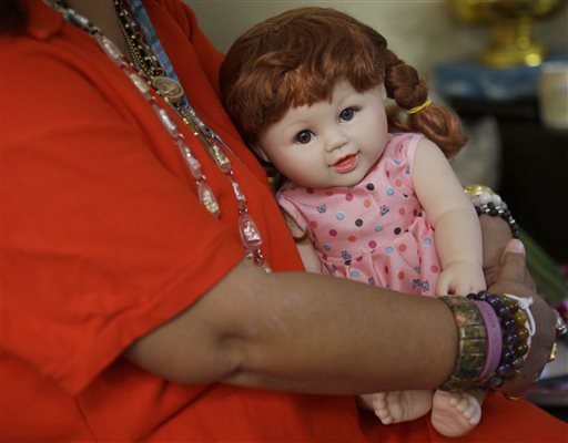 In Latest Fad, Thais Treat 'child Angel' Dolls like Progeny