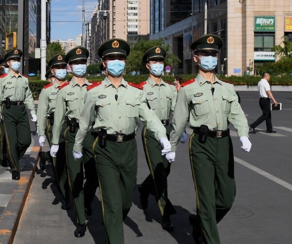 chinese soldiers wear masks