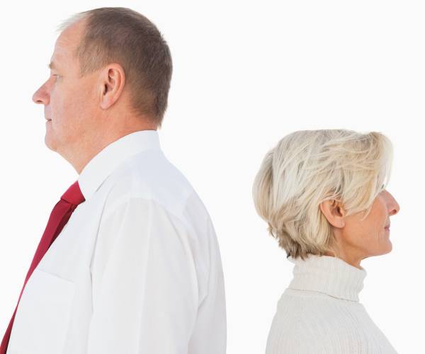 older couple with backs to each other