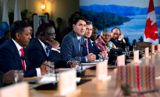 The Latest: White House Ramps up Verbal Attacks on Trudeau