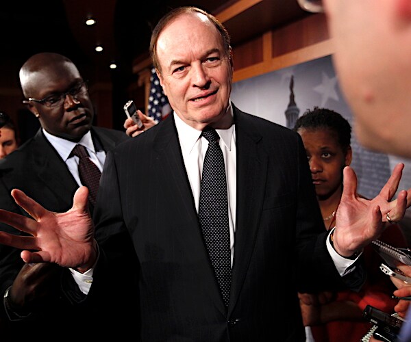 alabama republican senator richard shelby gestures with both hands palms up amid a media scrum