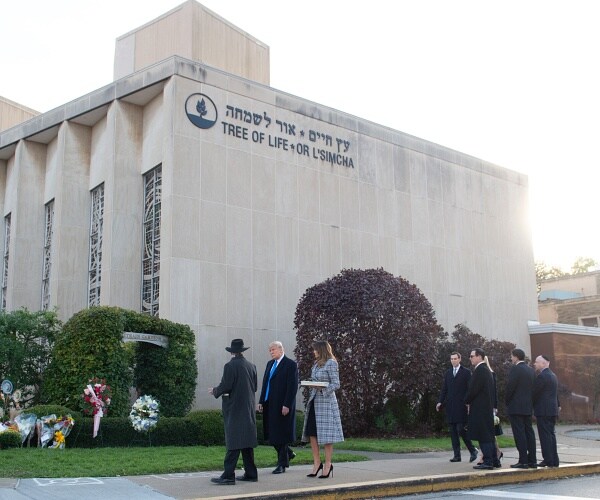 donald and melania trump and jeffrey myers walk outside synagogue