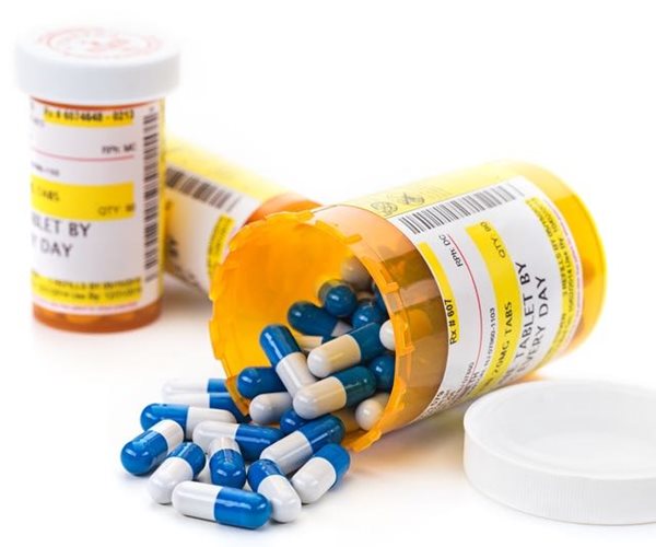 three bottles of pills