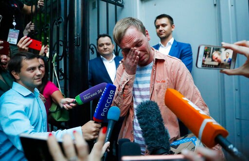 Putin Fires Police Officers Involved in Journalist's Case