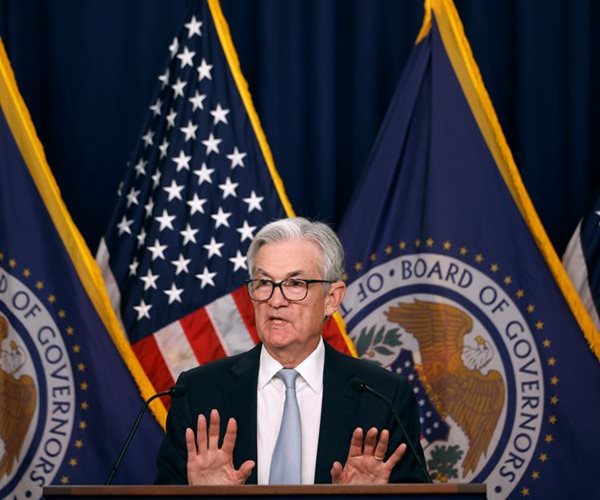 US Stock Futures Edge Lower Ahead of Powell's Speech 