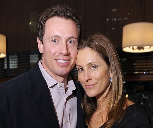 chris cuomo and cristina greeven cuomo pose cheek to cheek at a new york event