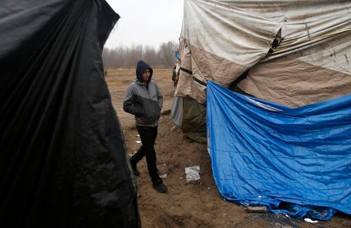 The Latest: Hungary to Put Refugees in Border Container Camp