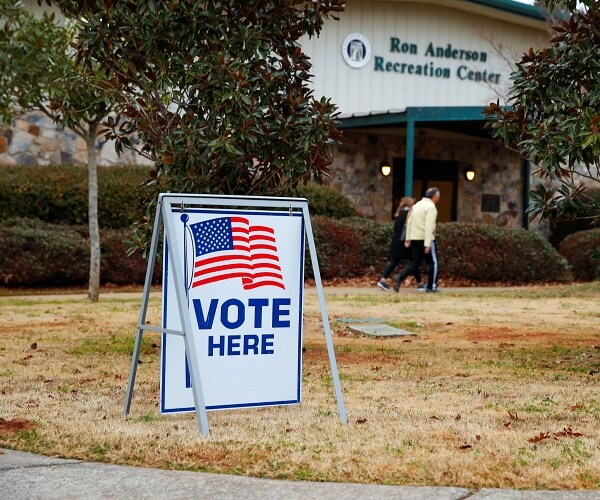 voters leave building after early voting