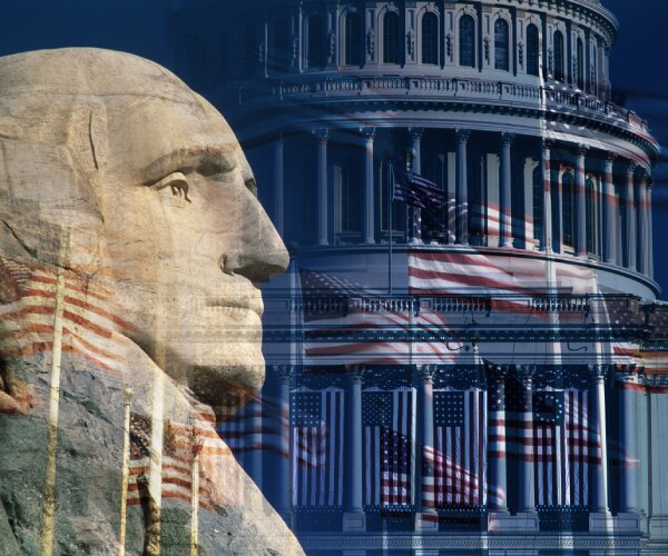 george washington's relief from mount rushmore against flags and the united states capitol
